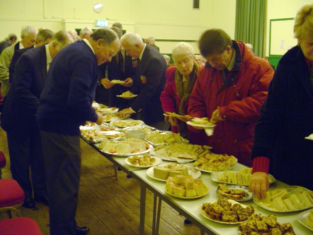 People at a buffet at Llanwrtyd Victoria hall