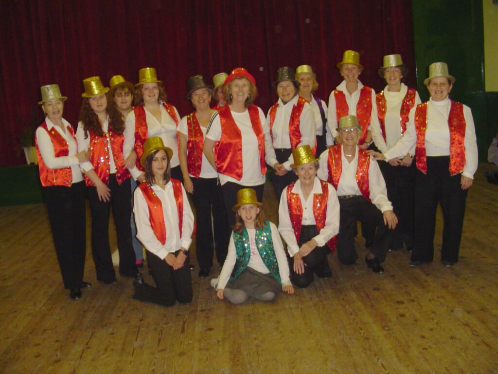 Dancers in costumes at Victoria hall, Llanwrtyd Wells